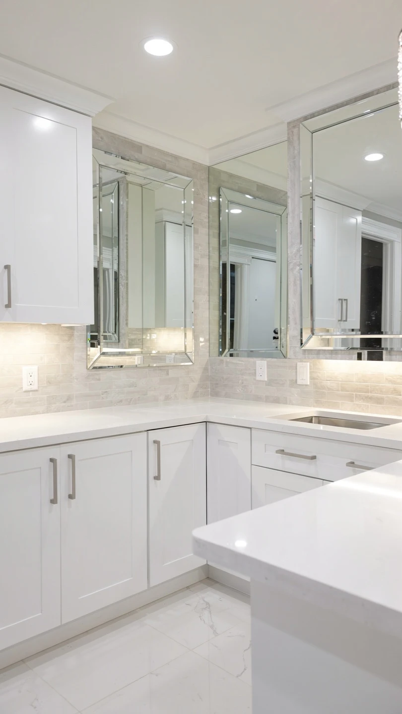 Bright White Basement Kitchenette With Reflective Finishes